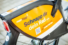 Eine Werbung für meinSiggi auf dem Schutzblech eines Fahrrads